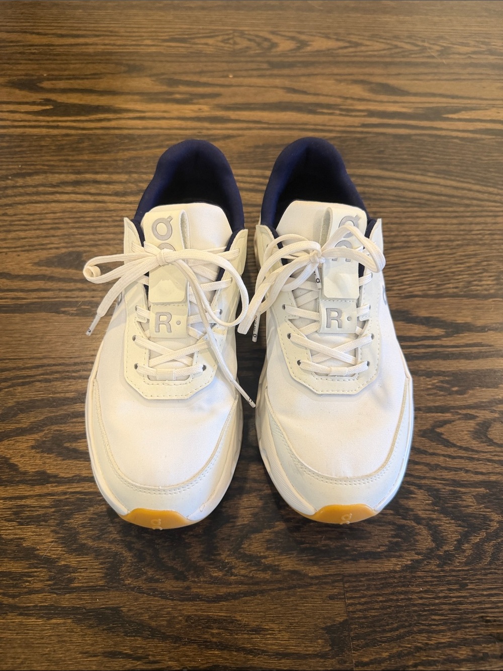 On Running Women's White Sneakers with Navy Lining and Yellow Toe Accents